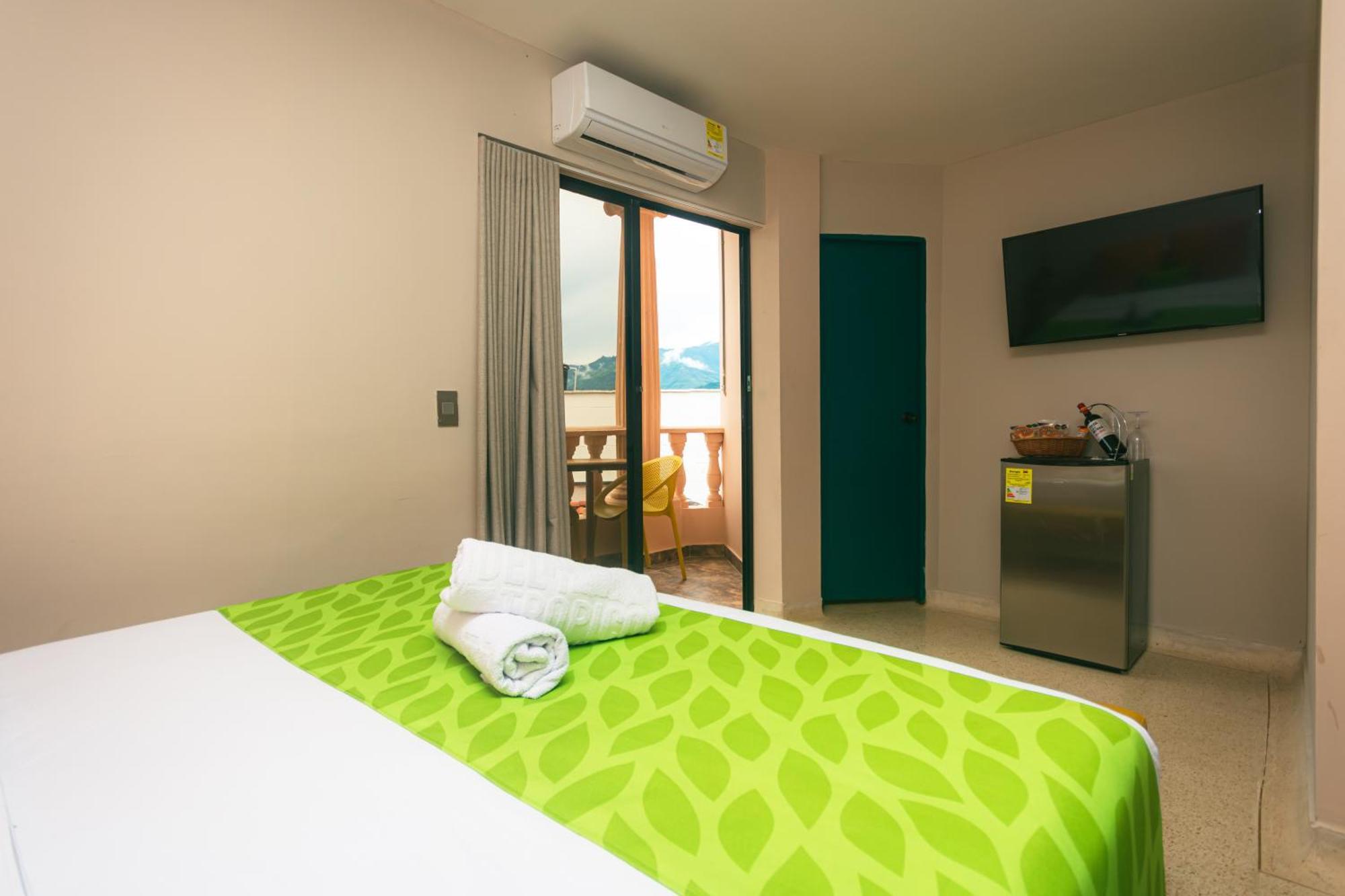 Del Tropico Hotel Sopetran Rum bild